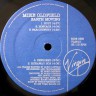 Oldfield_Mike_Earth_Moving_Can_3.jpg