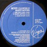 Oldfield_Mike_Earth_Moving_Can_4.jpg